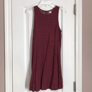Short maroon dress with orange and pink flowers